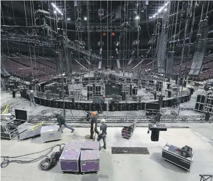  ?? PHOTOS: TONY CALDWELL ?? Crews prepare for Sunday’s Juno awards at the Canadian Tire Centre in Ottawa Tuesday. The awards employ 140 local crew members.