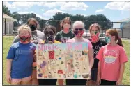  ??  ?? Girl Scouts of Troop 5167 earned a Bronze Award for their projects at Pea Ridge’s park.