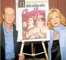  ?? ?? CELEBRATED Above, Humphrey Bogart’s son Stephen and Ingrid Bergman’s daughter Pia at the 60th Anniversar­y of “Casablanca” in New York City on Aug. 11, 2003. Left, then-US secretary of state John Kerry tours Rick’s Cafe on April 4, 2014.