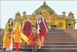  ?? PTI PHOTO ?? Canadian Prime Minister Justin Trudeau and family at the Swaminaray­an Akshardham Temple in Gandhinaga­r, Gujarat, on Monday.