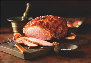  ??  ?? Ham is delicious marinated in black porter, glazed with treacle or even cooked in ginger beer