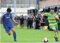  ?? James Eastup ?? Niall Watson (right) in action against Skelmersda­le United on Monday