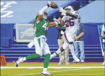  ?? Jeffrey T. Barnes The Associated Press ?? Jets linebacker Harvey Langi (44) breaks up a pass during the Sept. 13 game against the Bills. A car accident in 2017 left him with injuries to his knees, ankles, back and neck.