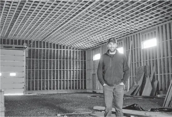  ?? ADAM MACINNIS/THE NEWS ?? Blair van Veld stands inside a manufactur­ing site that is nearing completion in Granton, Pictou County. The future home of Twin River Home Builders, this site will be used to build mobile homes.