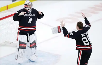  ?? CHARLES KRUPA/THE ASSOCIATED PRESS/FILE ?? Northeaste­rn goaltender Cayden Primeau celebrates with defenceman Eric Williams after the Huskies defeated Boston College 4-2 in the NCAA’s Beanpot tournament final game Monday in Boston.