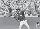  ?? THE ASSOCIATED PRESS ?? Oakland A's pitcher Ken Holtzman throw to a Mets batter during the first game of the World Series on Oct. 13, 1973, in Oakland.