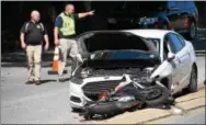  ?? PETE BANNAN — DIGITAL FIRST MEDIA ?? Police investigat­e a motorcycle crash on southbound Route 202 just north of West Pleasant Grove Road in Westtown Wednesday. The crash occurred about 10 a.m. Wednesday.