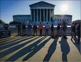  ?? J. SCOTT APPLEWHITE — THE ASSOCIATED PRESS ?? Anti-abortion activists demonstrat­e at the Supreme Court in Washington on Monday.