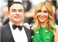  ?? — AFP photo ?? Ghosn and wife Carole in a file photo.