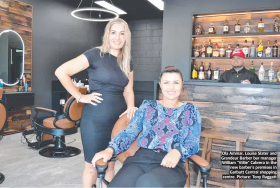  ?? ?? Ola Ammar, Louise Slater and Grandeur Barber bar manager William "Villie" Cabrera in the new barber's premises in Garbutt Central shopping centre. Picture: Tony Raggatt