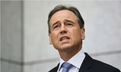  ?? ?? Health minister Greg Hunt says the doubt surroundin­g funding for the PCR tests needed for travel into Queensland may be because of an ‘accident’. Photograph: Lukas Coch/EPA