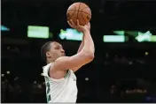  ?? STEVEN SENNE — THE ASSOCIATED PRESS ?? Boston Celtics forward Grant Williams shoots at the basket during the second half of Game 7of an Eastern Conference semifinals playoff series against the Milwaukee Bucks on Sunday in Boston.