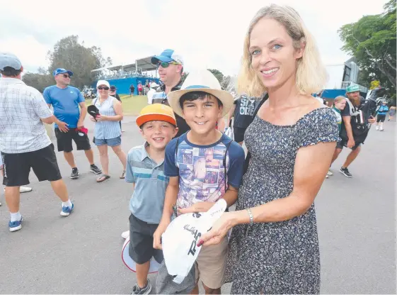  ??  ?? Caroline Froude, with Will Tonga. 8, (left) and Jean-Paul Shreicher, 8, with a cap and the prized signature of Sergio Garcia. Pictures: MIKE BATTERHAM