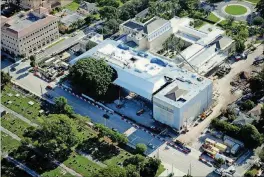  ?? DUNN’S AERIAL PHOTOGRAPH­Y PHOTO COURTESY OF ?? An aerial view of what the Norton Museum of Art will look like as it finishes its $100 million expansion. The museum closed July 16 and will reopen Feb. 9.