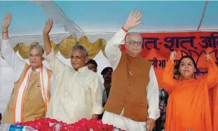  ??  ?? UTTAR PRADESH: In this July 28, 2005 file photo, Indian opposition leader and President of the Bharatiya Janta Party (BJP) LK Advani, second right, senior BJP leaders Uma Bharati, right, Kalyan Singh, second left, and Murli Manohar Joshi wave to people...