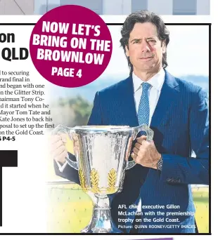  ?? Picture: QUINN ROONEY/GETTY IMAGES ?? AFL chief executive Gillon McLachlan with the premiershi­p trophy on the Gold Coast.