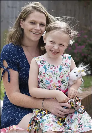  ??  ?? RECOVERING: Lottie with mother Charlotte after treatment in New York