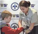  ?? NEW ORLEANS INTL. AIRPORT ?? Travelers can pet a baby alligator in New Orleans.