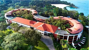  ??  ?? A view of the Capella Hotel, the venue for the June 12 summit between Trump and Kim on the resort island of Sentosa. — Reuters photo