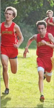  ?? PETE BANNAN — DIGITAL FIRST MEDIA ?? Haverford’s Mike Donnelly, right, zooms by Penncrest’s Justin Senackerib in a regular season tri-meet. Just a sophomore, Donnelly went from 10th at Delcos to qualifying for the PIAA Class 3A championsh­ips, where he finished 101st.