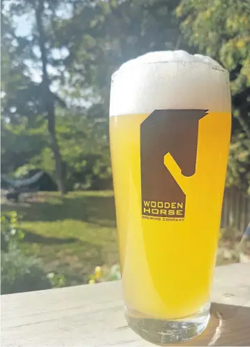  ?? WAYNE NEWTON/SPECIAL TO POSTMEDIA NEWS ?? Wooden Horse’s seasonal Saison Kombucha blends beer with Chinese kombucha tea.