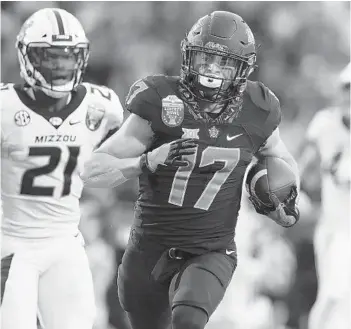  ?? Defensive starters lost: JOE RONDONE/AP Weaknesses: ?? Oklahoma State wide receiver Dillon Stoner runs in for a touchdown against Missouri during the 2018 Liberty Bowl. Stoner will be among the Cowboys’ top returning players this season. Aug. 30 at Oregon State Sept. 7 McNeese State Sept. 14 at Tulsa Sept. 21 at Texas Sept. 28 Kansas State Oct. 5 at Texas Tech Oct. 19 Baylor
Oct. 26 at Iowa State Nov. 2 TCU
Nov. 16 Kansas
Nov. 23 at West Virginia Nov. 30 Oklahoma