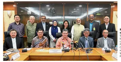  ??  ?? Meeting of minds: Saifuddin (seated, centre) flanked by CCFP members at Wisma Putra.