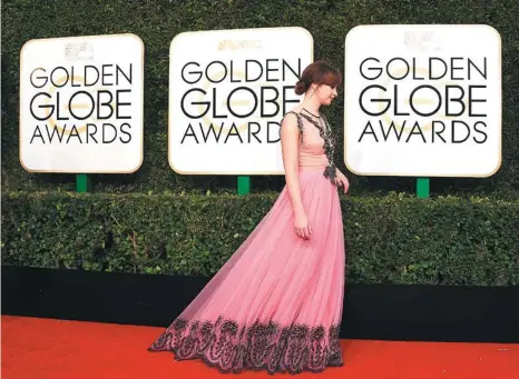  ??  ?? Felicity Jones arrives at the 74th annual Golden Globe Awards at the Beverly Hilton Hotel in Beverly Hills, California.