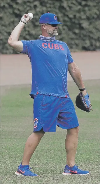  ?? MARK BLACK/AP ?? Cubs manager David Ross has to spend a lot of time talking about the coronaviru­s these days.