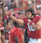  ?? MARK HOFFMAN/MILWAUKEE JOURNAL SENTINEL ?? Quarterbac­k Myles Burkett's dualthreat ability could make him a good fit in the Badgers' new offense.