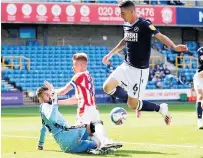  ??  ?? Bartosz Bialkowski (left) saves from Sam Clucas
MAN OF THE MATCH: REFEREE: