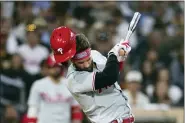  ?? DERRICK TUSKAN — THE ASSOCIATED PRESS ?? Philadelph­ia Phillies’ Bryce Harper reacts after being hit by a pitch from San Diego Padres’ Blake Snell during the fourth inning of a baseball game Saturday, June 25, 2022, in San Diego.