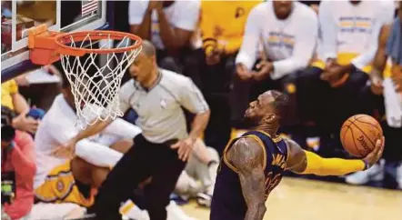  ?? REUTERS PIC ?? Cavaliers’ LeBron James dunks against the Pacers in the NBA Playoffs on Thursday.