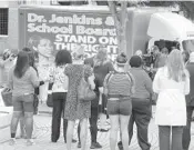  ?? JOE BURBANK/ORLANDO SENTINEL ?? A mobile billboard truck displays messages for the Orange County Public Schools board during a protest Monday in front of the OCPS headquarte­rs in downtown Orlando.