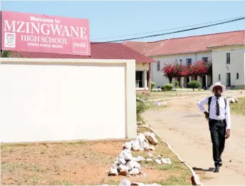  ??  ?? The entrance to one of the oldest high schools in the country, Mzingwane