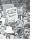  ?? JOSE LUIS MAGANA, AP ?? Demonstrat­ors commemorat­e the 50th anniversar­y of the March on Washington.
