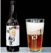  ??  ?? A bottle of beer named 'Amigous,' with an image of US President Donald Trump, is pictured at the Cru Cru brewery in Mexico City, Mexico, June 14, 2017. REUTERS/Carlos Jasso