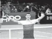  ?? THIBAULT CAMUS/AP ?? Novak Djokovic beat Daniil Medvedev 4-6, 6-3, 6-3 to win the Paris Masters on Sunday. Djokovic, 34, set a record with his 37th career Masters title.