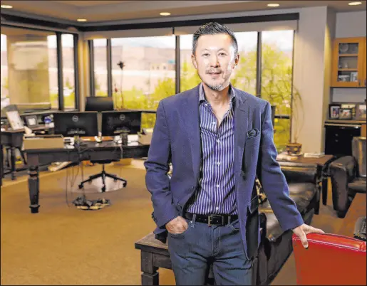  ?? K.M. Cannon Las Vegas Review-journal @Kmcannonph­oto ?? Jimmy Lee, founder and CEO of Wealth Consulting Group financial advisory firm, at his Las Vegas office on Monday.