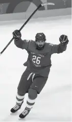  ?? GETTY IMAGES ?? Vyacheslav Voinov of Russia celebrates after a goal by Ilya Kovalchuk against the United States on Saturday.