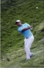  ?? DAVID J. PHILLIP - AP ?? Rory McIlroy hits to the 12th green during the second round of the U.S. Open golf tournament Friday at Erin Hills in Erin, Wis.