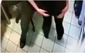  ?? ?? CCTV shared by McDonald’s worker Bobbie appears to show a male colleague enter the office, hug her and lower his hands to her bottom, which she says was uninvited