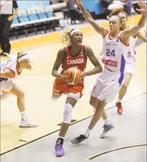  ?? Canada Basketball ?? Aaliyah Edwards, center, announced her commitment to UConn on Thursday.