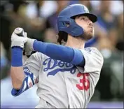  ?? David Zalubowski Associated Press ?? CODY BELLINGER’S MVP performanc­e in 2019 seems like a distant memory for some Dodgers fans.