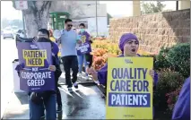  ?? COURTESY OF SEIU-UNITED HEALTHCARE WORKERS WEST ?? Employees at the Garfield Medical Center picket in front of the facility Tuesday, claiming they're chronicall­y understaff­ed.