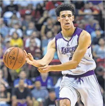  ?? JOE CAMPOREALE, USA TODAY SPORTS ?? The Lakers’ Lonzo Ball scored five points Friday, and on Saturday he had a triple- double with 11 points, 11 rebounds and 11 assists.