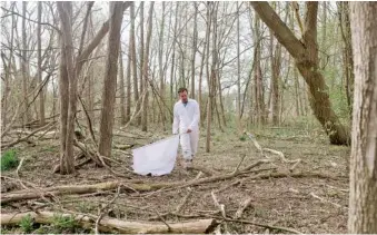  ?? KATE WARREN/THE NEW YORK TIMES ?? Brian Leydet, a biologist at SUNY College of Environmen­tal Science and Forestry, collects ticks in April by walking through wooded areas, in Fayettevil­le, N.Y.