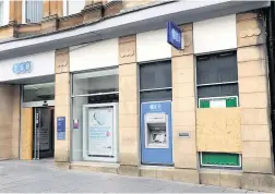  ??  ?? Target The boarded-up bank in Paisley’s High Street after Robertson’s attack