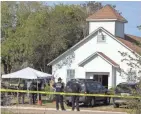  ?? NICK WAGNER, AUSTIN AMERICAN-STATESMAN / AP ?? Law enforcemen­t officials work at the scene of a fatal shooting at the First Baptist Church in Sutherland Springs, Texas, on Sunday.