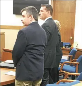  ?? TRACEY READ — THE NEWS-HERALD ?? Fairport Harbor resident Damian Square, left, is shown when he went on trial Aug. 21 on rape charges. At right is defense attorney Matthew Bangerter.